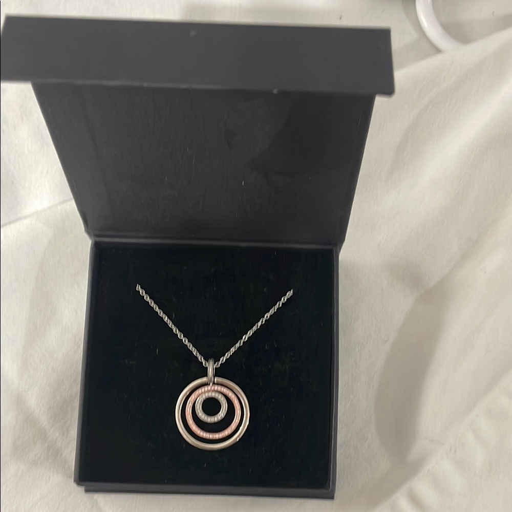 Elegant Silver and Gold Pendant Necklace